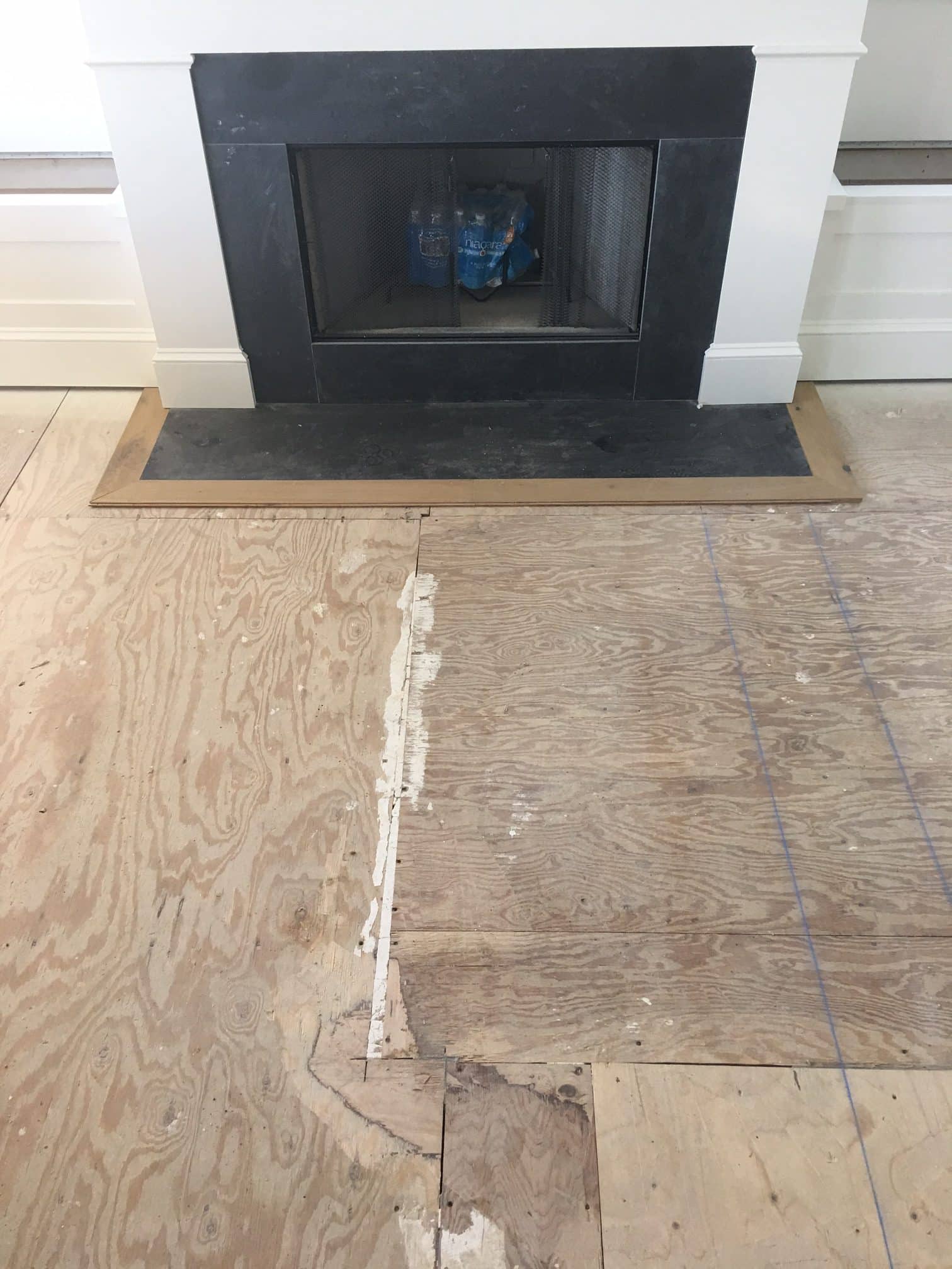Gallery 6 Wooden floor with a white and black chimney on the wall