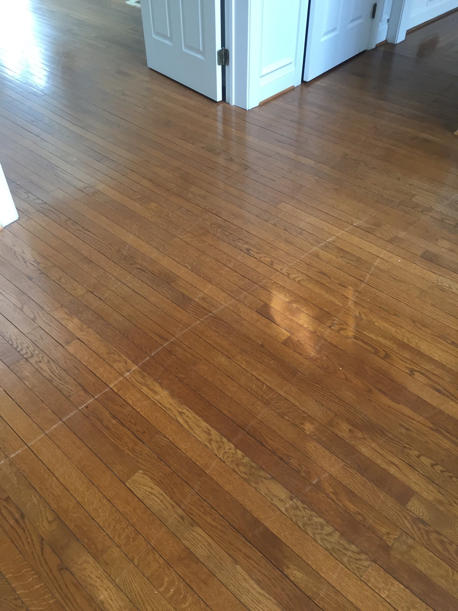 Gallery 8 Hardwood Flooring with scratches